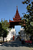 Myanmar - Mandalay, The Royal Palace, the huge tiered roof tower of walled enclosure. 